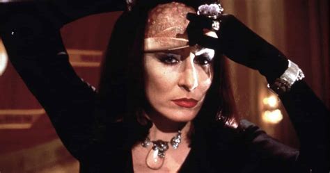 Cher portraying a witch